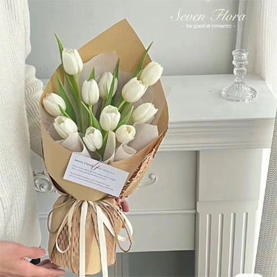 11 white tulips to city